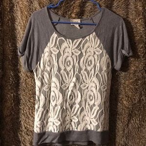 Gray shirt with lace front.